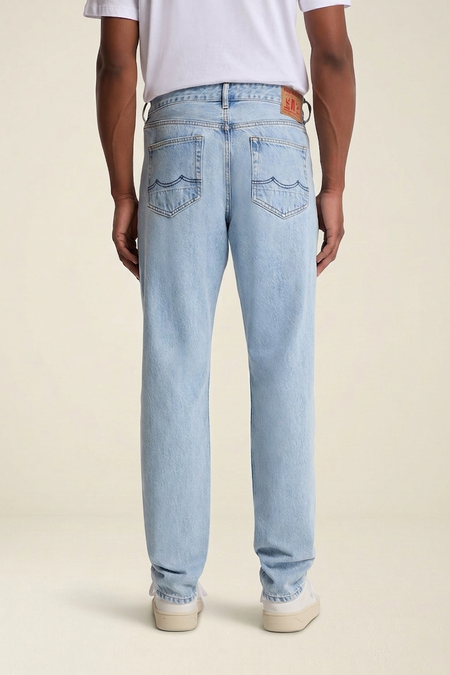 Jean fuselé en coton bio | denim clair "sushan - blue reef super light used" - Kings of Indigo