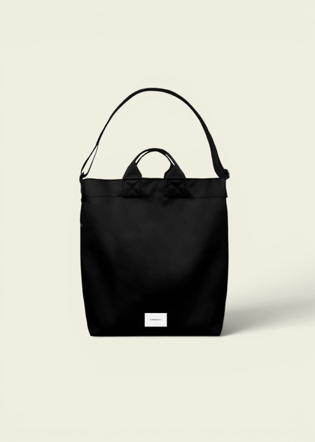 Sac tote/bandoulière 19l en matière recyclée | noir "ground shopper bag - black" - Sandqvist