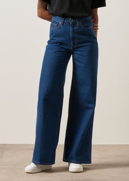 Jean évasé en coton bio et recyclé | bleu foncé "sara high loose stone indigo" - Mud Jeans