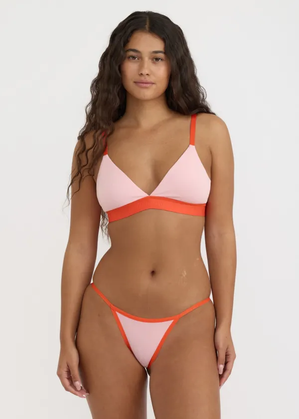 Culotte en coton bio | rose "core play string bikini briefs - marshmellow pink / vibrant red", Organic Basics
