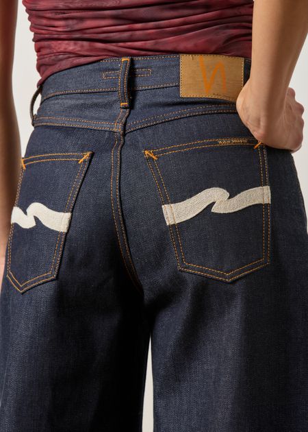 Jean wide leg en coton bio | bleu "Sonic sue dry ecru waves" - Nudie Jeans