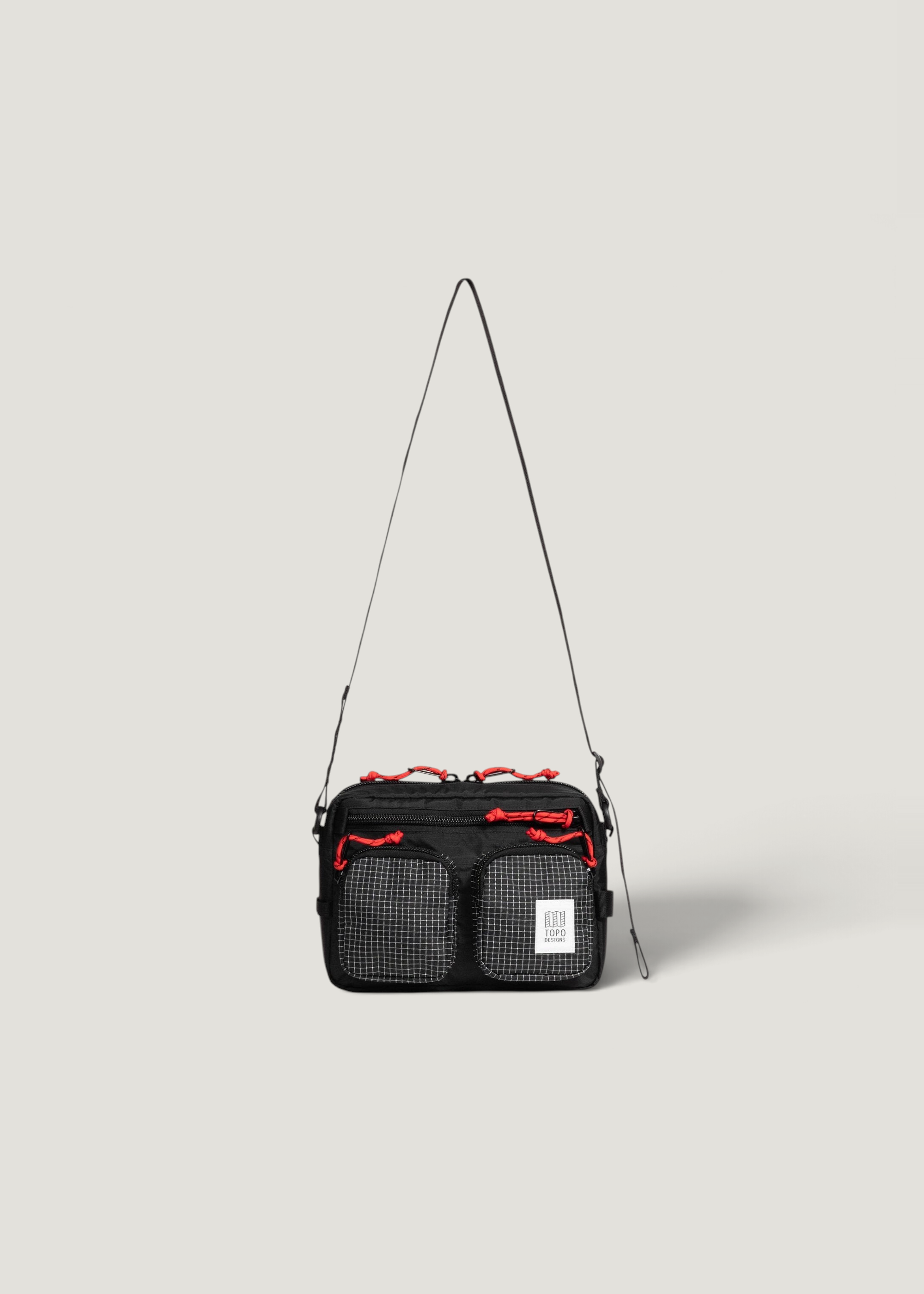 Umhängetasche 3,5L aus recyceltem Material | Mehrfarbig "Block bag 3.5l - black grid", Topo Designs, Foto 1